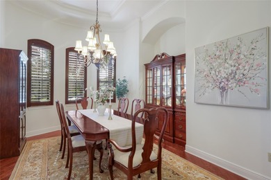 Set on nearly a half acre at the end of a quiet cul-de-sac with on Ritz-Carlton Members Golf Club in Florida - for sale on GolfHomes.com, golf home, golf lot