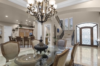 Welcome to 2325 Demaret Drive, an iconic and timeless estate on London Bridge Golf Course in Arizona - for sale on GolfHomes.com, golf home, golf lot