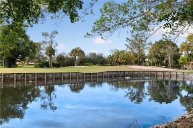 Wake up to serene lake and golf course views from this furnished on Quail Run Golf Club In Naples in Florida - for sale on GolfHomes.com, golf home, golf lot