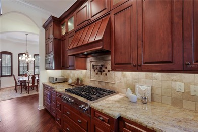 Set on nearly a half acre at the end of a quiet cul-de-sac with on Ritz-Carlton Members Golf Club in Florida - for sale on GolfHomes.com, golf home, golf lot