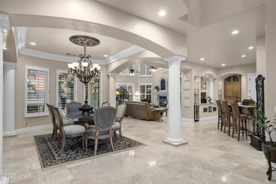 Welcome to 2325 Demaret Drive, an iconic and timeless estate on London Bridge Golf Course in Arizona - for sale on GolfHomes.com, golf home, golf lot