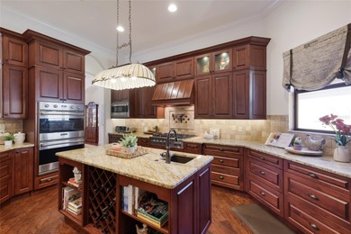 Set on nearly a half acre at the end of a quiet cul-de-sac with on Ritz-Carlton Members Golf Club in Florida - for sale on GolfHomes.com, golf home, golf lot