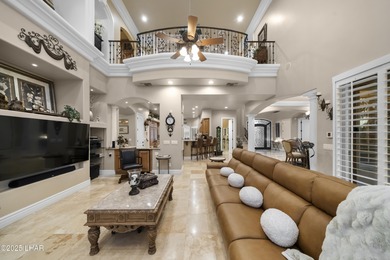 Welcome to 2325 Demaret Drive, an iconic and timeless estate on London Bridge Golf Course in Arizona - for sale on GolfHomes.com, golf home, golf lot