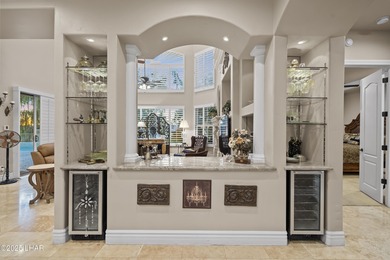 Welcome to 2325 Demaret Drive, an iconic and timeless estate on London Bridge Golf Course in Arizona - for sale on GolfHomes.com, golf home, golf lot