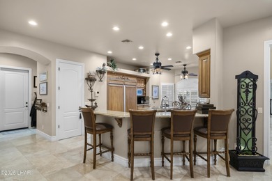 Welcome to 2325 Demaret Drive, an iconic and timeless estate on London Bridge Golf Course in Arizona - for sale on GolfHomes.com, golf home, golf lot