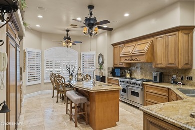 Welcome to 2325 Demaret Drive, an iconic and timeless estate on London Bridge Golf Course in Arizona - for sale on GolfHomes.com, golf home, golf lot