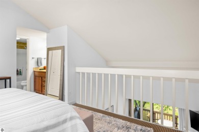 Perched above the third tee of Spruce Run Golf Course, this on Grand Traverse Resort and Spa in Michigan - for sale on GolfHomes.com, golf home, golf lot