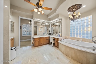 Welcome to 2325 Demaret Drive, an iconic and timeless estate on London Bridge Golf Course in Arizona - for sale on GolfHomes.com, golf home, golf lot