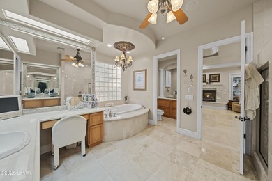 Welcome to 2325 Demaret Drive, an iconic and timeless estate on London Bridge Golf Course in Arizona - for sale on GolfHomes.com, golf home, golf lot