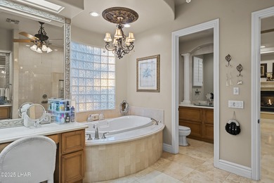 Welcome to 2325 Demaret Drive, an iconic and timeless estate on London Bridge Golf Course in Arizona - for sale on GolfHomes.com, golf home, golf lot