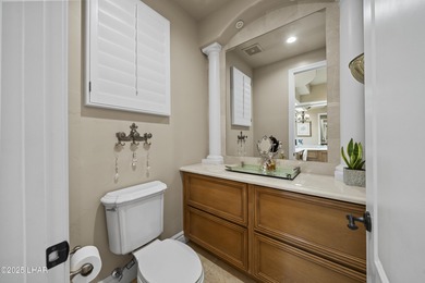 Welcome to 2325 Demaret Drive, an iconic and timeless estate on London Bridge Golf Course in Arizona - for sale on GolfHomes.com, golf home, golf lot