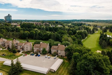 Perched above the third tee of Spruce Run Golf Course, this on Grand Traverse Resort and Spa in Michigan - for sale on GolfHomes.com, golf home, golf lot