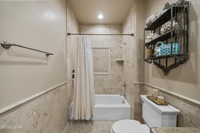 Welcome to 2325 Demaret Drive, an iconic and timeless estate on London Bridge Golf Course in Arizona - for sale on GolfHomes.com, golf home, golf lot