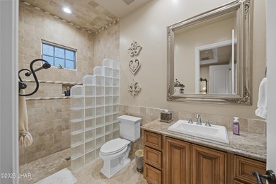 Welcome to 2325 Demaret Drive, an iconic and timeless estate on London Bridge Golf Course in Arizona - for sale on GolfHomes.com, golf home, golf lot