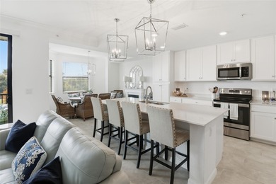 This exceptional second-floor residence is ready to welcome you on Lakewood National Golf Club in Florida - for sale on GolfHomes.com, golf home, golf lot