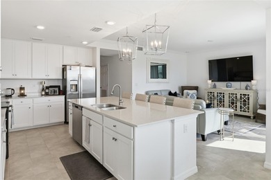 This exceptional second-floor residence is ready to welcome you on Lakewood National Golf Club in Florida - for sale on GolfHomes.com, golf home, golf lot