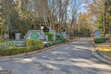 The moment you enter the private gates of Ardsley Park at on The Golf Club of Georgia in Georgia - for sale on GolfHomes.com, golf home, golf lot