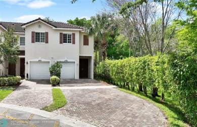 Welcome to your private retreat in this corner unit townhome on Colony West Country Club in Florida - for sale on GolfHomes.com, golf home, golf lot