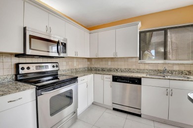 VIEWS FOR DAYS!!  This 2nd Floor End-Unit Condo Has The BEST on Indian Spring Golf and Country Club in Florida - for sale on GolfHomes.com, golf home, golf lot