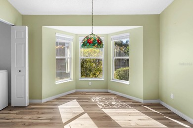 Step into effortless Florida living in this beautifully on Falcon Watch Golf Club in Florida - for sale on GolfHomes.com, golf home, golf lot