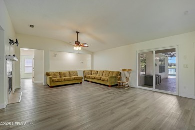 **POOL HOME**OPEN FLOOR PLAN**FENCED BACKYARD** Welcome home to on St. Johns Golf Club in Florida - for sale on GolfHomes.com, golf home, golf lot