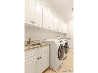 Impeccable maintenance, updates, and pride of ownership make on Wynlakes Golf and Country Club in Alabama - for sale on GolfHomes.com, golf home, golf lot