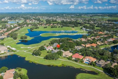 Luxury Champions Club custom built Costanza home perfectly on Fox Hollow Golf Club in Florida - for sale on GolfHomes.com, golf home, golf lot