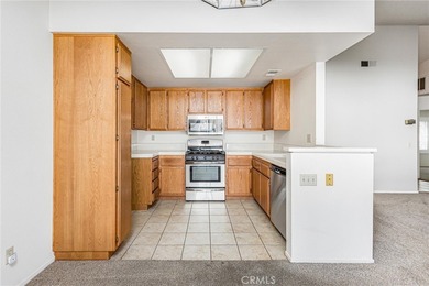 Santa Rosa Plan with patio area and gate to greenbelt area of on Sun Lakes Country Club in California - for sale on GolfHomes.com, golf home, golf lot