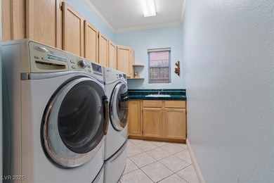 Elegant single-story residence in Sun City Summerlin offering on Eagle Crest Golf Club in Nevada - for sale on GolfHomes.com, golf home, golf lot