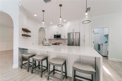 Discover this beautifully updated and move-in ready 4-bedroom on Stoneybrook Golf Club in Florida - for sale on GolfHomes.com, golf home, golf lot