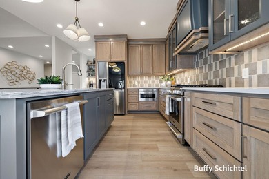 Experience refined living in this stunning golf course property on Muskegon Country Club in Michigan - for sale on GolfHomes.com, golf home, golf lot