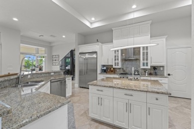 Experience unparalleled luxury in this 6,823-sq-ft under air on The Wanderers Club in Florida - for sale on GolfHomes.com, golf home, golf lot