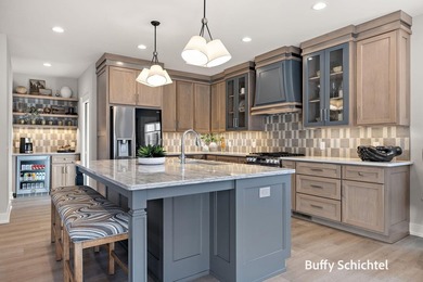 Experience refined living in this stunning golf course property on Muskegon Country Club in Michigan - for sale on GolfHomes.com, golf home, golf lot