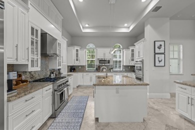 Experience unparalleled luxury in this 6,823-sq-ft under air on The Wanderers Club in Florida - for sale on GolfHomes.com, golf home, golf lot