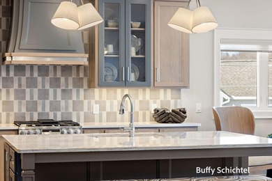 Experience refined living in this stunning golf course property on Muskegon Country Club in Michigan - for sale on GolfHomes.com, golf home, golf lot