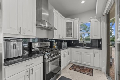 Experience unparalleled luxury in this 6,823-sq-ft under air on The Wanderers Club in Florida - for sale on GolfHomes.com, golf home, golf lot