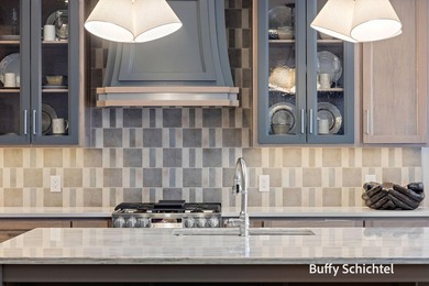 Experience refined living in this stunning golf course property on Muskegon Country Club in Michigan - for sale on GolfHomes.com, golf home, golf lot