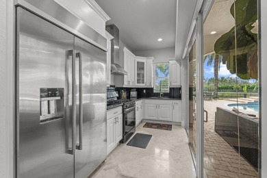 Experience unparalleled luxury in this 6,823-sq-ft under air on The Wanderers Club in Florida - for sale on GolfHomes.com, golf home, golf lot