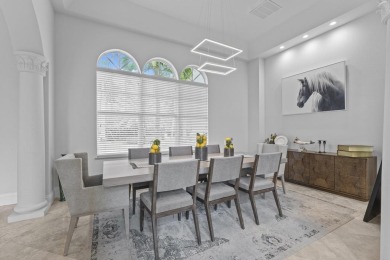 Experience unparalleled luxury in this 6,823-sq-ft under air on The Wanderers Club in Florida - for sale on GolfHomes.com, golf home, golf lot