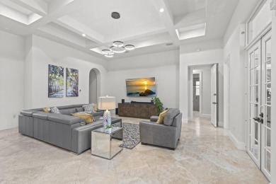 Experience unparalleled luxury in this 6,823-sq-ft under air on The Wanderers Club in Florida - for sale on GolfHomes.com, golf home, golf lot
