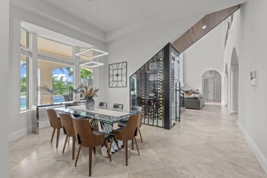 Experience unparalleled luxury in this 6,823-sq-ft under air on The Wanderers Club in Florida - for sale on GolfHomes.com, golf home, golf lot