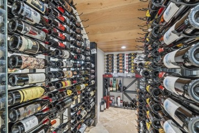 Experience unparalleled luxury in this 6,823-sq-ft under air on The Wanderers Club in Florida - for sale on GolfHomes.com, golf home, golf lot