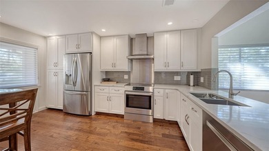 Unique opportunity! Luxuriously and tastefully renovated corner on The Meadows Golf and Country Club in Florida - for sale on GolfHomes.com, golf home, golf lot