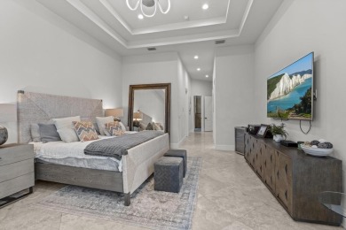 Experience unparalleled luxury in this 6,823-sq-ft under air on The Wanderers Club in Florida - for sale on GolfHomes.com, golf home, golf lot
