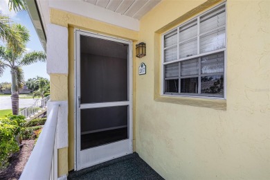 One or more photo(s) has been virtually staged. Charming upper on Capri Isle Golf Club in Florida - for sale on GolfHomes.com, golf home, golf lot