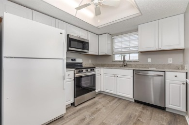 One or more photo(s) has been virtually staged. Charming upper on Capri Isle Golf Club in Florida - for sale on GolfHomes.com, golf home, golf lot