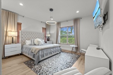 Experience unparalleled luxury in this 6,823-sq-ft under air on The Wanderers Club in Florida - for sale on GolfHomes.com, golf home, golf lot