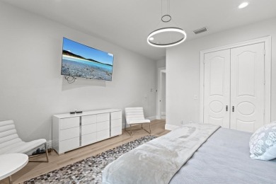 Experience unparalleled luxury in this 6,823-sq-ft under air on The Wanderers Club in Florida - for sale on GolfHomes.com, golf home, golf lot