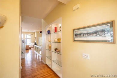 Experience elevated lakefront living at Lake of the Ozarks! One on Seasons Ridge At Four Seasons in Missouri - for sale on GolfHomes.com, golf home, golf lot