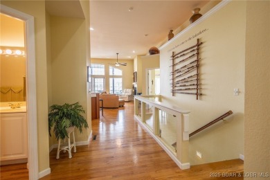 Experience elevated lakefront living at Lake of the Ozarks! One on Seasons Ridge At Four Seasons in Missouri - for sale on GolfHomes.com, golf home, golf lot